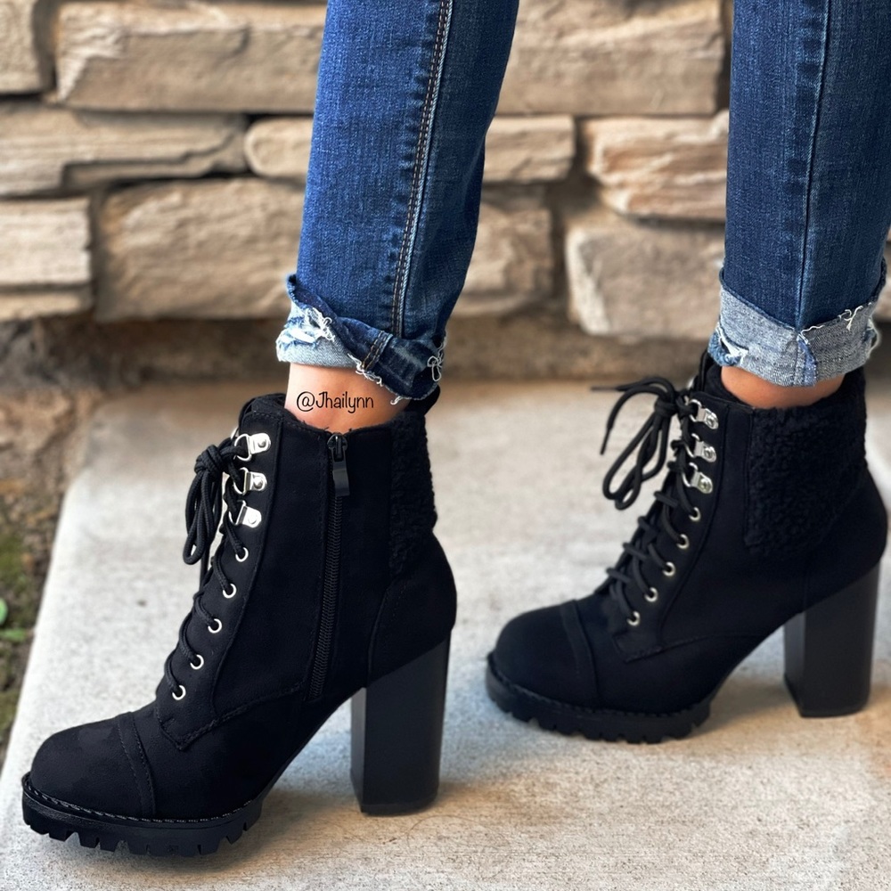 Black Sherpa lined lace up chunky lug sole boots